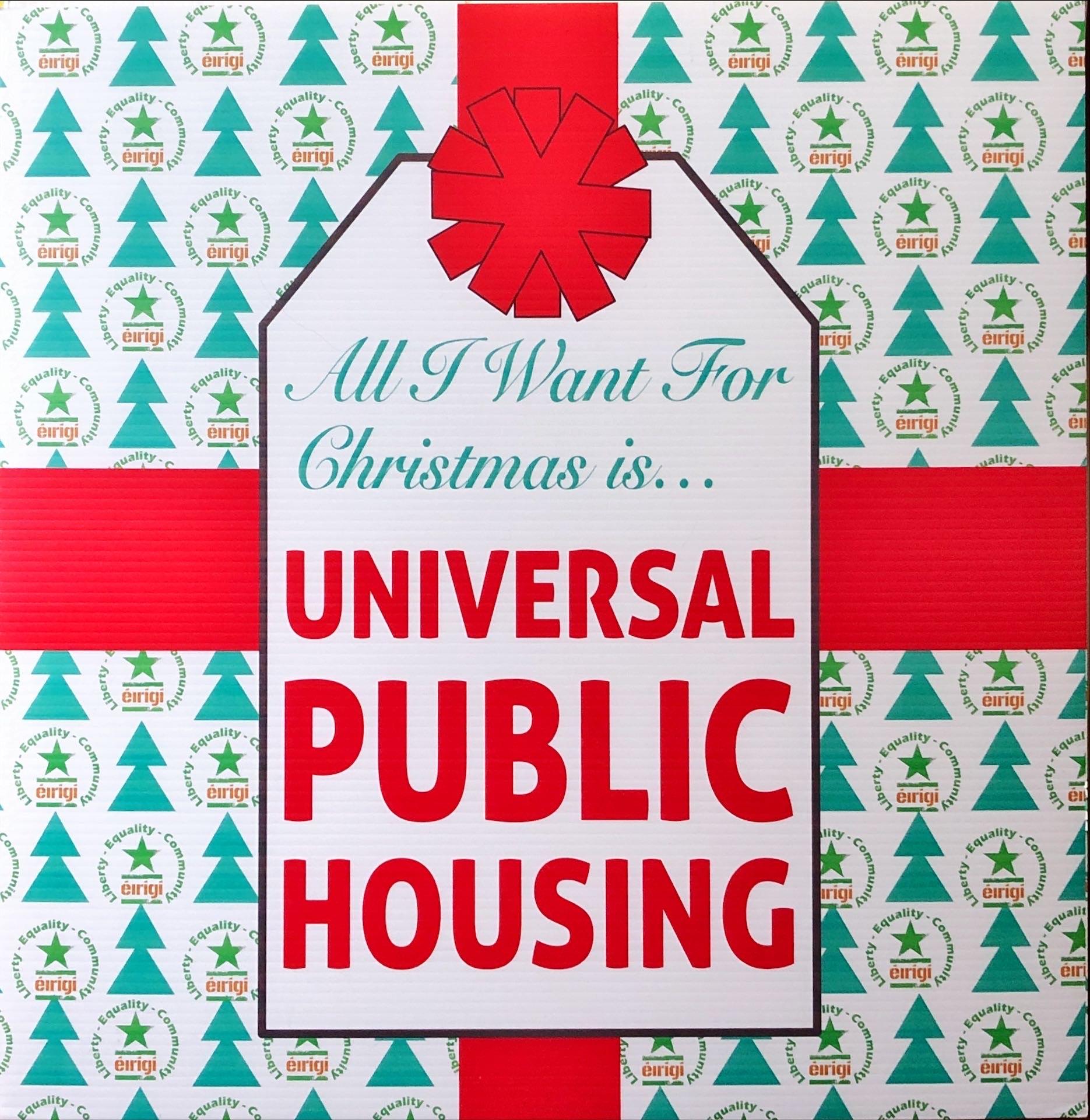 A poster designed to look like a wrapped Christmas present with a label reading: All I want for Christmas is universal public housing
