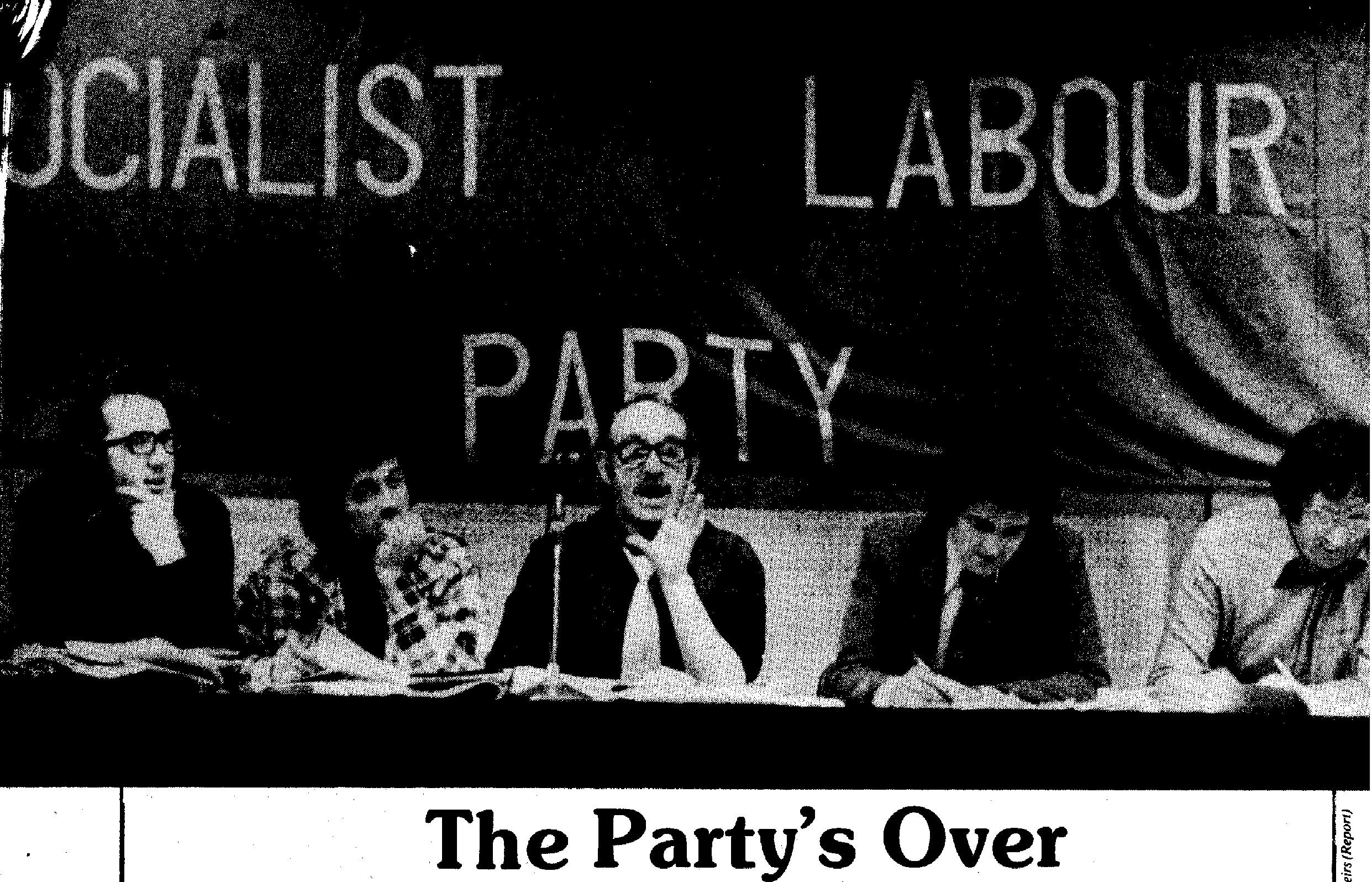 Scanned from a magazine, a photograph of SLP members with the party banner behind them and the caption The Party's Over.